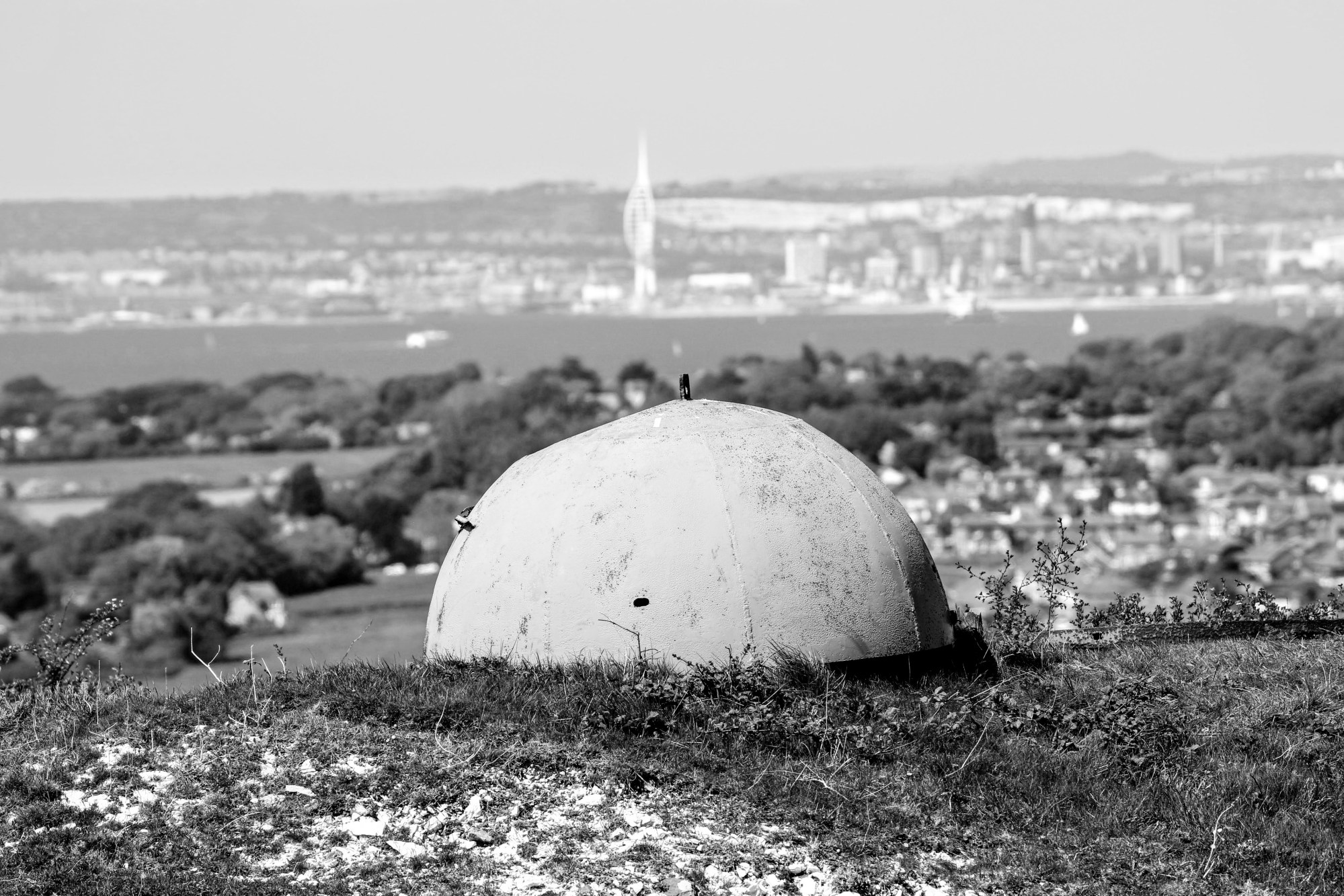 (BF003) - Bembridge Fort - I love the 'Echo of the Past' and modern architecture in this shot: The metal dome of the Fort in the foreground with the Spinnaker Tower in Portsmouth in the background.