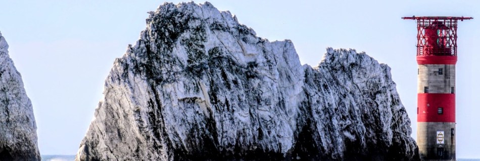 (TN 005) - i do like this iconic photo of The Needles and Lighthouse only possible from a boat, the contrast of the natural rugged white chalk rocks and the man-made Lighthouse with its famous red and white stripes.