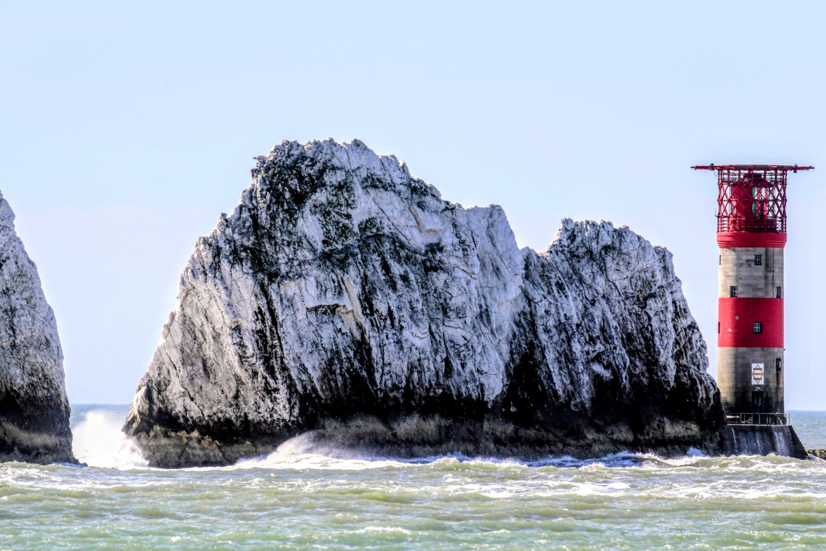 (TN 005) - i do like this iconic photo of The Needles and Lighthouse only possible from a boat, the contrast of the natural rugged white chalk rocks and the man-made Lighthouse with its famous red and white stripes.
